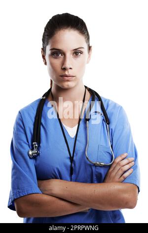 She takes your health seriously. Studio portrait of a beautiful young doctor standing with her arms crossed against a white background. Stock Photo