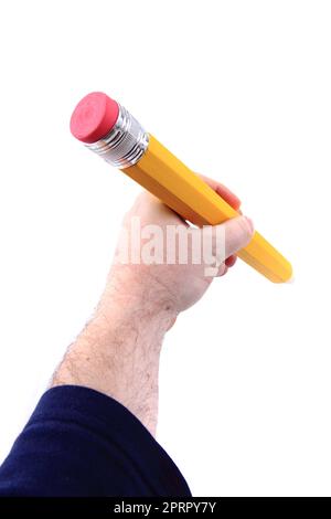 big pencil in human hand isolated on the white background Stock Photo