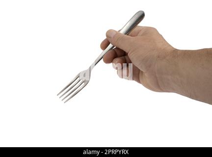 a fork in the hand of a man on a transparent background Stock Photo
