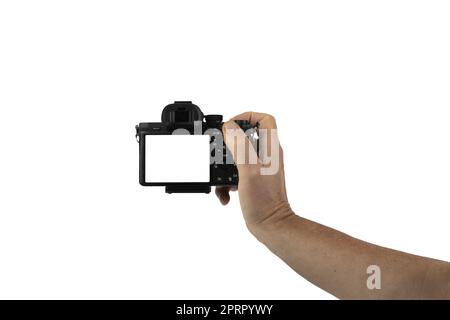 a mirrorless camera in a male hand on a transparent background Stock Photo