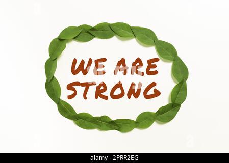 Text caption presenting We Are Strong. Word for Have great strength healthy powerful achieving everything Stock Photo