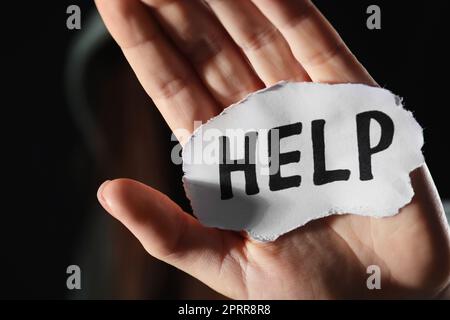 Cruel concept word on paper background Stock Photo - Alamy