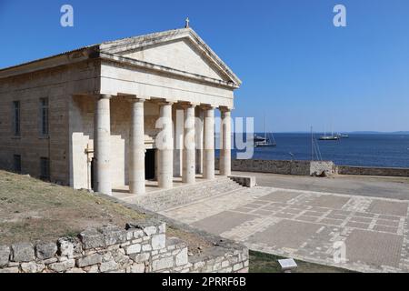 The old Venetian fortress of Corfu town and Holy Church of Saint George, Corfu, Greece. The Old Fortress of Corfu is a Venetian fortress in the city of Corfu. Venetian Old Fortress Stock Photo