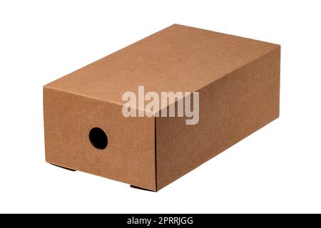 Closed brown cardboard box or kraft paper box with clipping path isolated on white background. Suitable for packaging. Macro. Stock Photo