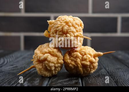 Snack for beer - deep fried cheese balls with sauce Stock Photo