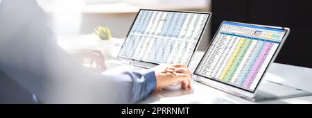 Analyst Working With Spreadsheet Business Data Stock Photo