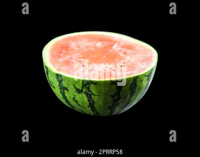 Watermelon slice isolated on black background Stock Photo