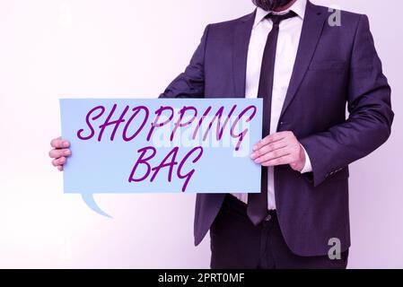 Writing displaying text Shopping Bag. Word for Containers for carrying personal possessions or purchases Stock Photo