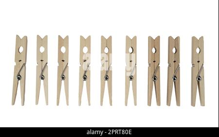 a row of wooden clothespins on a transparent background Stock Photo