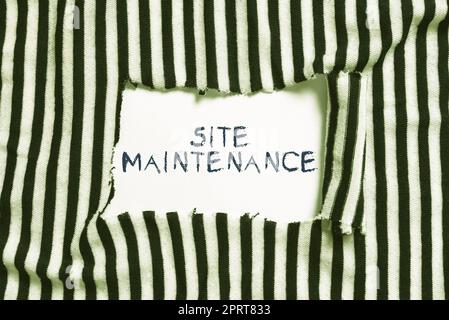 Hand writing sign Site Maintenance, Business showcase Monitoring and regularly checking your website for issues -57320 Stock Photo