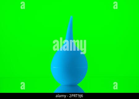 front view bulb syringe aspirator on neon green background Stock Photo