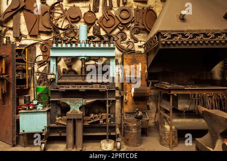 Craftsmanship and an appreciation for beautiful tools. a metal craftsmans workshop filled with metal tools. Stock Photo