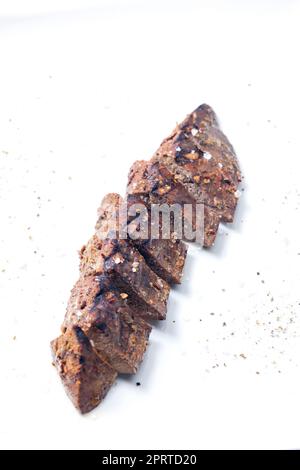 fried pork liver on white plate Stock Photo