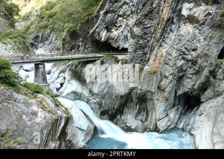 Beautiful view of the Ice blue river and the bridge over it in Tianxiang, Hualien, Taiwan Stock Photo
