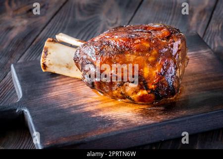 Cooked ham hock on the wooden cutting board Stock Photo