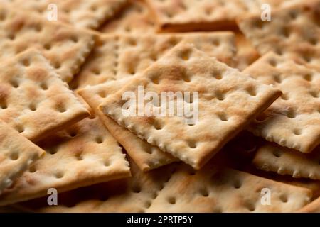 Crackers placed throughout the screen. Close-up. Stock Photo