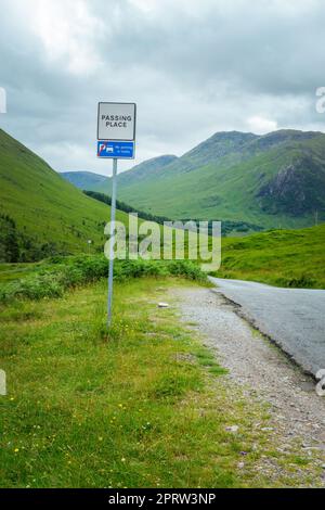 Typical Passing place roadsgn on a single track road in the Highlands of Scotland, UK Stock Photo