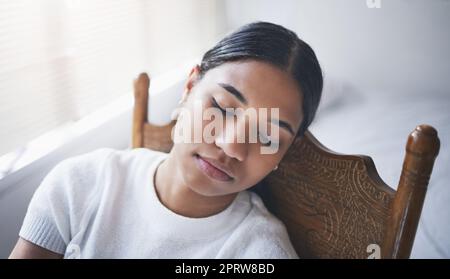 Depression, tired and sleeping woman for mental health, anxiety and stress about life fail, crisis and trauma. Sad, depressed and lonely young person with psychology problem, burnout and sick fatigue Stock Photo