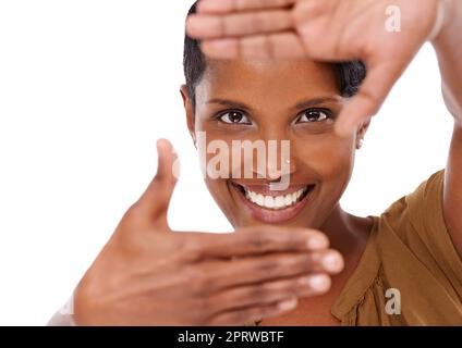 The biggest love you can ever feel is self love. Studio portrait of an  attractive and fit young woman framing her stomach with her hands against a  grey background Stock Photo 