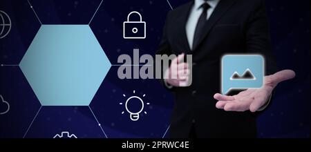 Business Man Presenting New Futuristic Technologies. Stock Photo