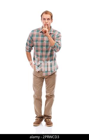 Hes got the style to match your copy. Studio shot of a handsome young man posing against a white background. Stock Photo