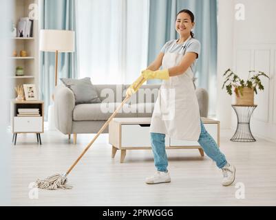 Premium Photo  Woman cleaning the floor with a mop in the living room in  home with a smile happy asian cleaner doing housework or job in a clean  lounge hotel room