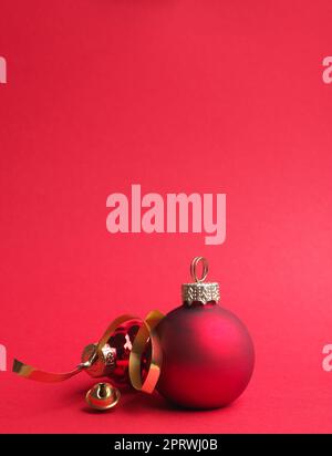 Vintage Christmas baubles on a red background with space for your text or image Stock Photo