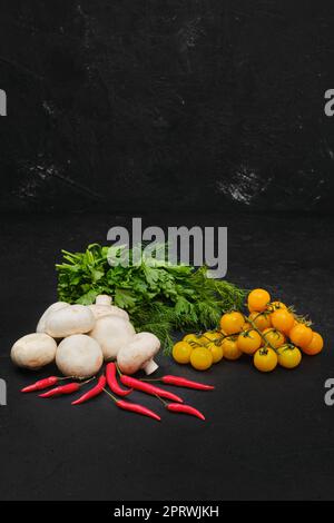 Fresh vegetables on black background Stock Photo