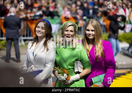ROTTERDAM - Queen Maxima, Princess Amalia and Princess Ariane during the celebration of King's Day in Rotterdam. The visit marked the tenth anniversary of Willem-Alexander's reign. ANP ROBIN VAN LONKHUIJSEN netherlands out - belgium out Stock Photo