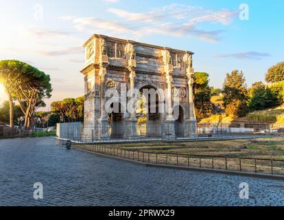 The Arch of Constantine at sunset, famous ancient triumphal arch of Rome, Italy Stock Photo