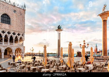 Venetian Cafe near Column of San Teodoro at sunrise, Venice, Italy Stock Photo