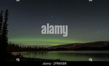 Northern Lights and the Plieades over Lake Boya Stock Photo