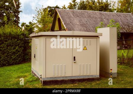 Electric high voltage distribution cabinet in a village Stock Photo