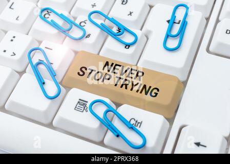 Text caption presenting Never Stop TryingDo not give up Continue to Try Again Keep on Doing. Conceptual photo Do not give up Continue to Try Again Keep on Doing Stock Photo