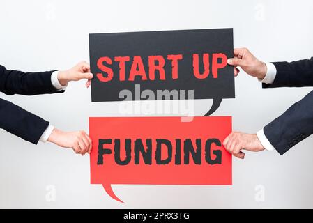 Sign displaying Start Up Fundingbegin to invest money in newly created company or campaign. Word Written on begin to invest money in newly created company or campaign Stock Photo