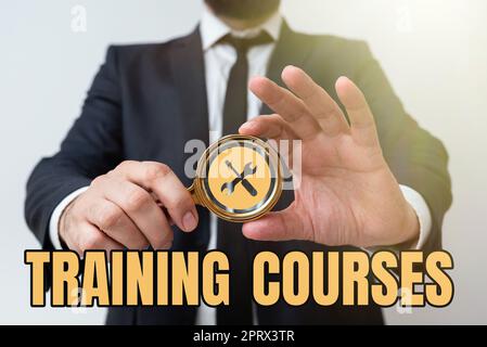 Text sign showing Training Coursesis series of lessons or lectures teaching skills you need. Concept meaning is series of lessons or lectures teaching skills you need Stock Photo