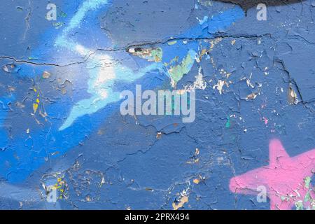 Colorful wall background with damaged paints of blue Stock Photo