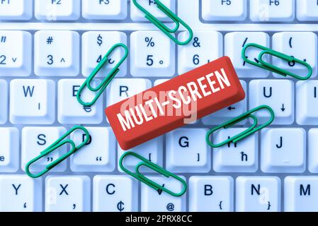 Hand writing sign Multi Screen, Conceptual photo Having or involving several screen especially in a cinema Stock Photo