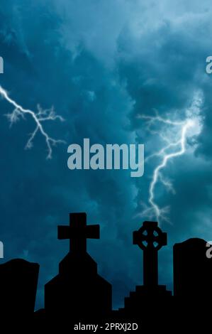 cemetery tombs and stormy sky Stock Photo