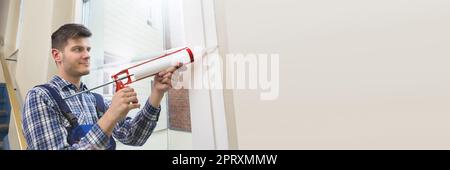Caulking Silicone Sealant To Repair Window In House Stock Photo