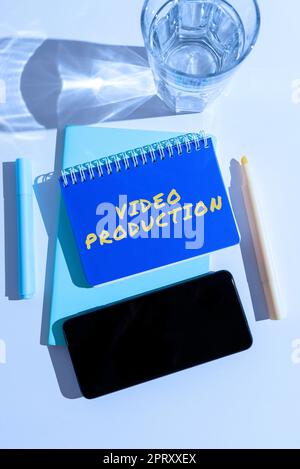 Handwriting text Video Production, Business overview program designed to protect computers from malware Computer Keyboard And Symbol.Information Mediu Stock Photo