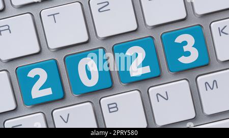 A  computer keyboard with the word 2023 Stock Photo