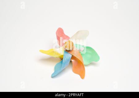 Colorful pinwheel on a white background Stock Photo