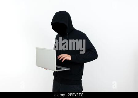 Man Standing With Laptop Presenting Cyber Security. Stock Photo