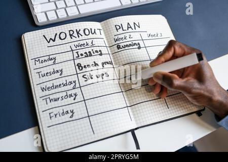 Workout Training Exercise Plan And Daily Schedule Stock Photo