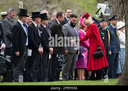 The Queen Consort attends a ceremony to present new Standards and Colours to the Royal Navy, the Life Guards of the Household Cavalry Mounted Regiment, The King's Company of the Grenadier Guards and The King's Colour Squadron of the Royal Air Force at Buckingham Palace in London. Picture date: Thursday April 27, 2023. Stock Photo