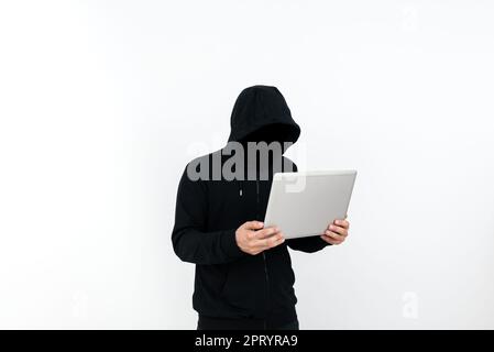 Man Standing With Laptop Presenting Cyber Security. Stock Photo