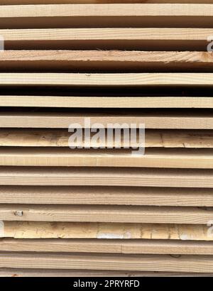 Wooden planks of wood stacked up to dry Stock Photo