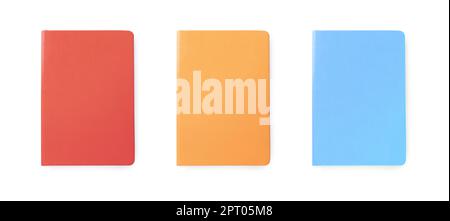 Set with multicolor notebooks on white background, top view. Banner design Stock Photo