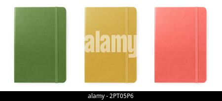 Set with multicolor notebooks on white background, top view. Banner design Stock Photo